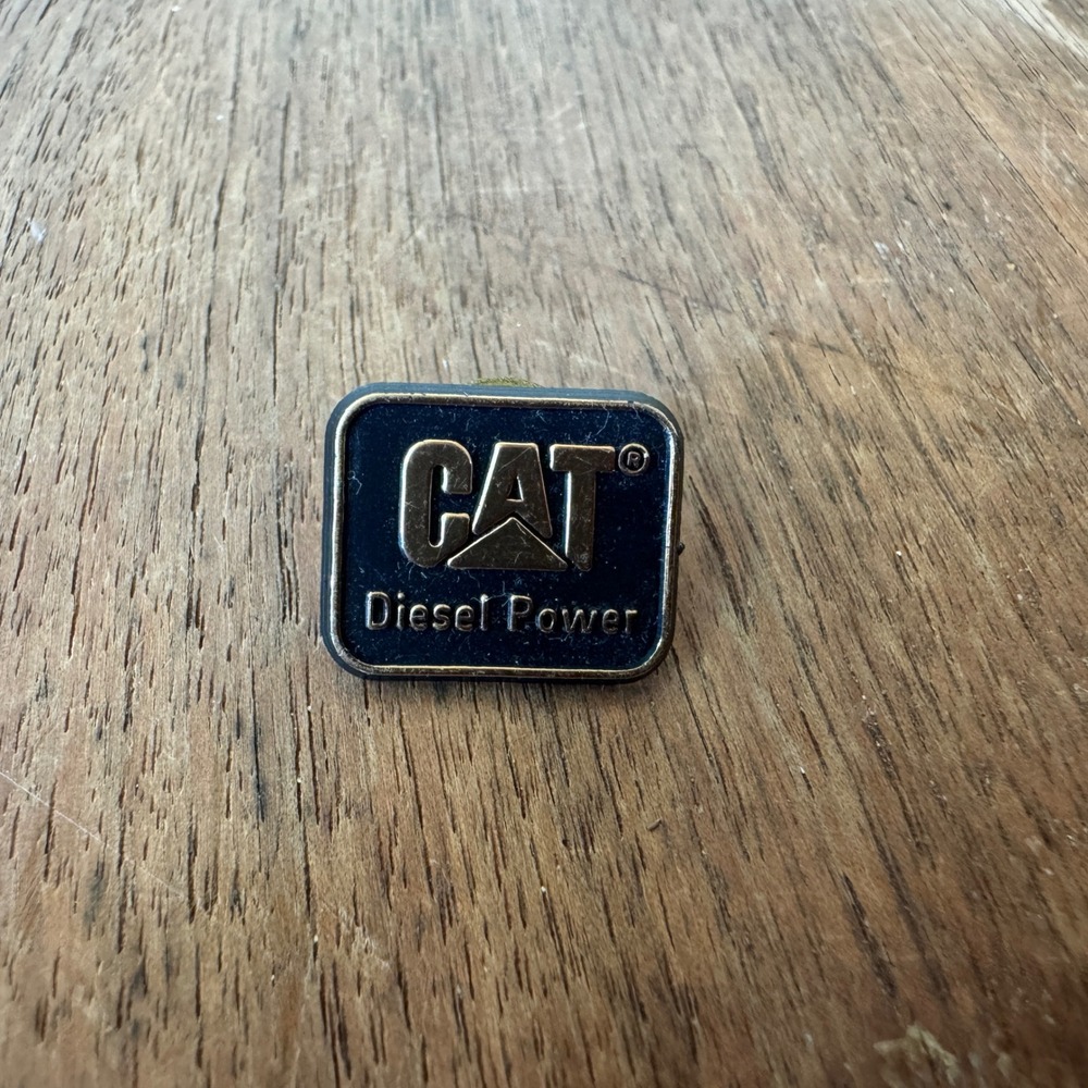 Vintage Black Gold Plastic Caterpillar‎ CAT Diesel Lapel Pin Brooch